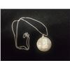 Image 1 : 1958 CANADIAN SILVER DOLLAR IN STERLING SILVER BEZEL