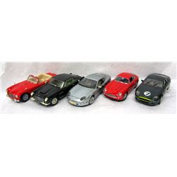 5 ASTON MARTIN CARS