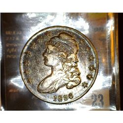 23.    1836 Capped Bust Half Dollar, full original toned EF.