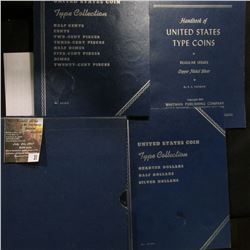 31.    Album holder with Type Set books, one of which contains a 1963 D Franklin Silver Half Dollar.