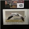 Image 1 : 425.2001 Iowa Dept. of Natural Resources Duck Stamp, depicting the Snow Goose flying over a picked C