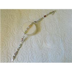 BRACELET - MULTI-GEMSTONE & DIAMOND IN STERLING SILVER SETTING - 9 OVAL FACETED GEMS - ESTIMATED RET