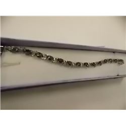 BRACELET - 20 CTW (15) OVAL FACETED OCEAN BLUE MYSTIC TOPAZ IN STERLING SILVER SETTING - RETAIL ESTI