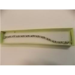 BRACELET - 12 OVAL FACETED WHITE TOPAZ & DIAMOND IN STERLING SILVER INFINITY LINK DESIGNED SETTING -