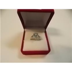 RING - 3.5CT PEAR FACETED LIVELY SKY BLUE TOPAZ & 2 DIAMONDS IN STERLING SILVER SETTING - ESTIMATED 