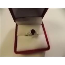 RING - LARGE 1CT OVAL FACETED GARNET & 2 DIAMONDS IN STERLING SILVER SETTING - RETAIL ESTIMATE $300