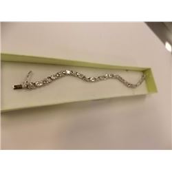 BRACELET - 12 OVAL FACETED WHITE TOPAZ & DIAMOND IN STERLING SILVER INFINITY LINK DESIGNED SETTING -