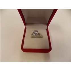 RING - 3.5CT PEAR FACETED LIVELY SKY BLUE TOPAZ & 2 DIAMONDS IN STERLING SILVER SETTING - ESTIMATED 