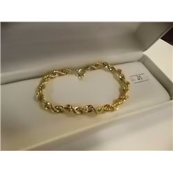 BRACELET - GOLD CLAD SPIRAL DESIGNED BRACELET - RETAIL ESTIMATE $100