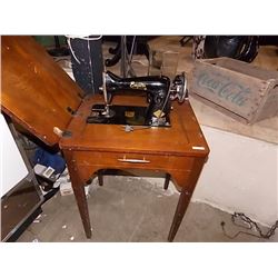 EMPIRE VINTAGE ELECTRIC SEWING MACHINE IN CABINET