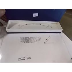 BRACELET - 1.5CTW ENHANCED PINK SAPPHIRE IN 14K WHITE GOLD SETTING - INCLUDES CERTIFICATE $800