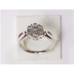 RING- 7 DIAMONDS IN STERLING SILVER FLOWER DESIGN SETTING - RETAIL ESTIMATE $400