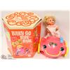 Image 1 : VINTAGE BABY GO BYE BYE IN HER BUMPETY BUG