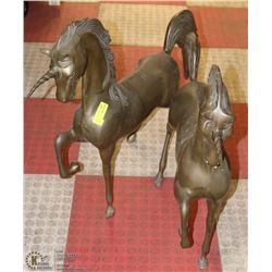 TWO LARGE METAL UNICORNS