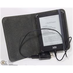 KOBO E READER MODEL # 0560 WITH CHARGER AND CASE