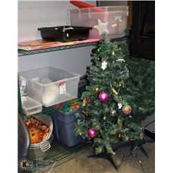 4 RACKS OF ASSORTED SUPPLIES, 2 XMAS TREES & MORE