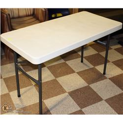 WHITE FOLDING PLASTIC TABLE