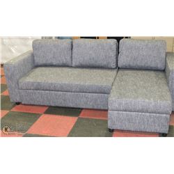 GREY FABRIC APT SIZE SECTIONAL CONVERTS INTO BED