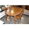 Image 2 : ROUND MAPLE DINING TABLE AND FOUR CHAIRS