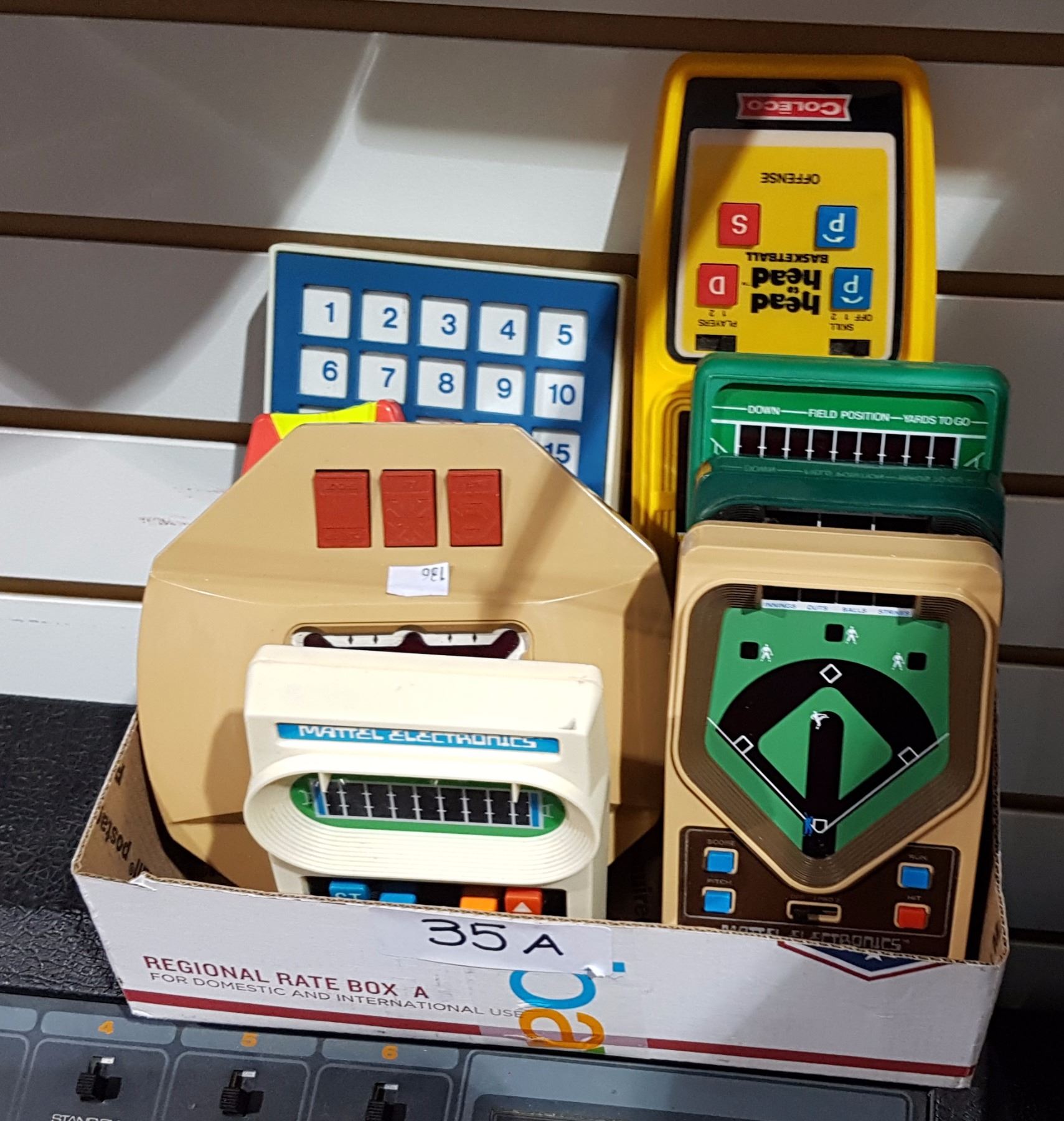 BOX LOT OF 8 COLECO & MATTEL ELECTRONIC HAND HELD GAMES