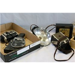 TWO VINTAGE CLOCKS AND CAMERAS AND SLIDES ETC