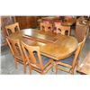 Image 1 : ANTIQUE TIGER OAK DINING TABLE WITH FOUR LEAFS AND SIX T-BACK CHAIRS