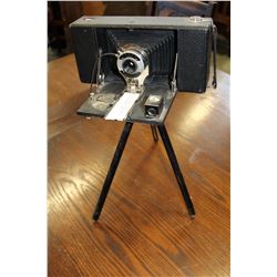 ANTIQUE CAMERA ON STAND WITH BRASS EXTENDABLE LEGS