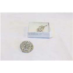 TWO RHINESTONE PINS