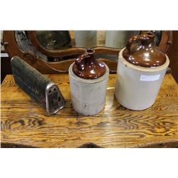 TWO MEDALTA JUGS AND FOOT WARMER