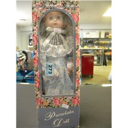 BOOXED PORCELEIN DOLL