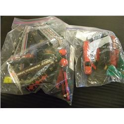 2 BAGS OF MINI TRAIN CARTS