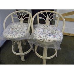 2 MATCHING RATTAN SWIVEL BAR STOOLS WITH COUSHINS