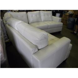 3 PIECE CREAM COLOURED STITCHED LEATHER SECTIONAL COUCH (FREIGHT DAMAGED APPROX 12" CUT ON BACK)