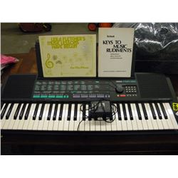 YAMAHA PORTABLE KEYBOARD WITH CORD AND SONG BOOKS