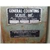 Image 2 : Weight 	Scale on casters