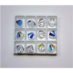 #3 - LOT OF 12 SWAROVSKI 8MM BICONE BEADS