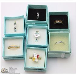 7 FASHION RINGS IN RING BOXES