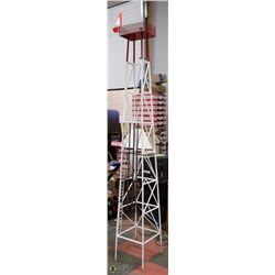 DRILLING DERRIK W/ 3 LENGTHS OF DRILL PIPE INSIDE