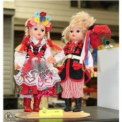 PAIR OF ESTATE COLLECTOR DOLLS ON STAND