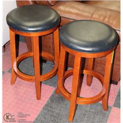 2 WOOD AND LEATHERETTE ROUND STOOLS