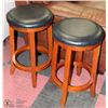 Image 1 : 2 WOOD AND LEATHERETTE ROUND STOOLS