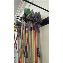 Grouping of various shovels and scraper, Sledge  hammer, rake, broom