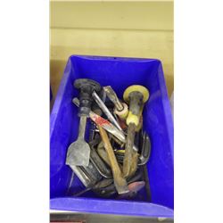 Tub with c-clamps and assorted chisels
