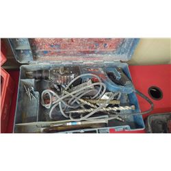 Makita model HR2435 hammer drill with bits