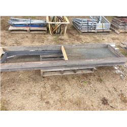 Two sand screens and bundle of stone starter strip