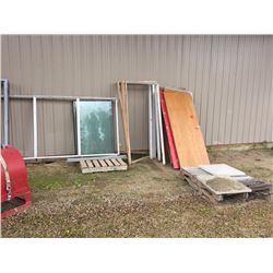 Variety of doors, frames, windows, window frames, and 3 pallets of scrap iron