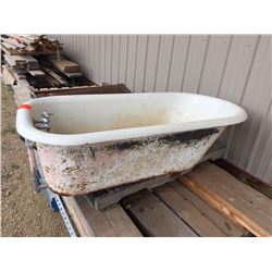 Antique cast iron claw foot bath tub