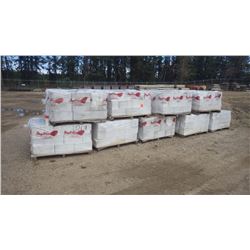Nine pallets new white split faced block