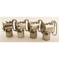 Four Handheld Justrite Lamps