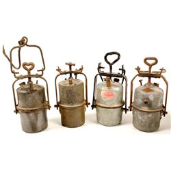 Four Large Carbide Lamps